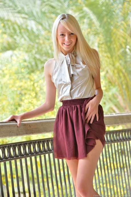 Hot teen flashes a naked upskirt before stuffing her beaver with a ball 14551067