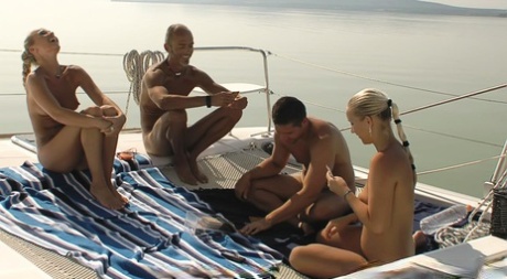 Blonde girls and their boyfriends have a foursome fuck while on a boat 84630592