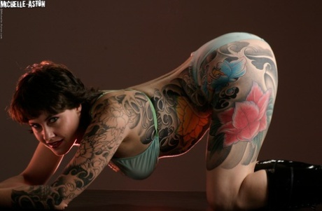 Heavily tattooed female Michelle Aston models solo in sheer lingerie set 43398383