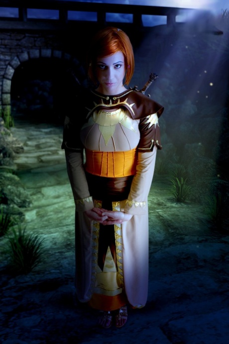 Redheaded cosplayer sets her firm breasts free under a moon 99415076