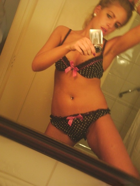 Sexy British girl Dani Divine takes selfies in a mirror while getting naked 98019255