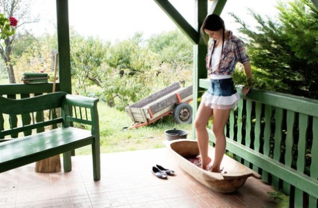 Country girls Vanda Lust & Minnie Manga pleasure lesbian pussies on a veranda 78280800