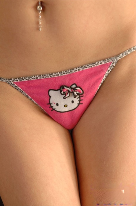 Redhead Korina Bliss strips to her hello kitty panties and fishnet kneehighs 82028158