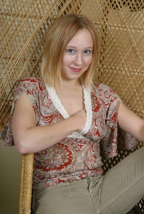 Teen first timer Mackenzie holds her breasts while taking off her clothes 13434549