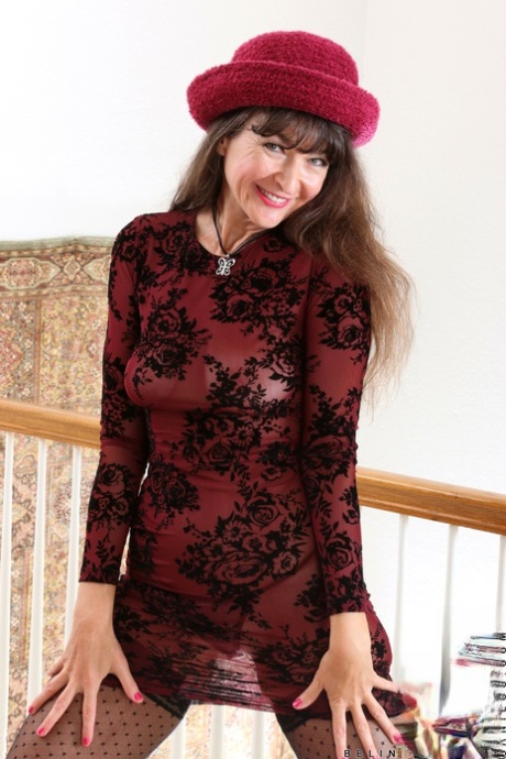 Mature lady Belinda Brush plays with her bald twat after a striptease 86858692