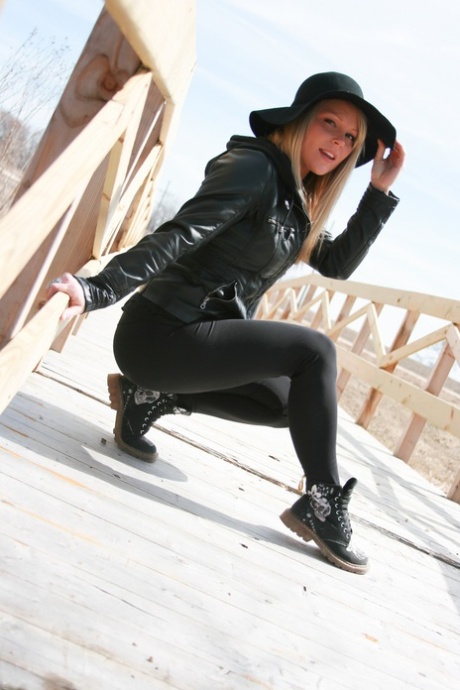 Blonde amateur Meet Madden slips black leggings over her thong clad ass 60107480
