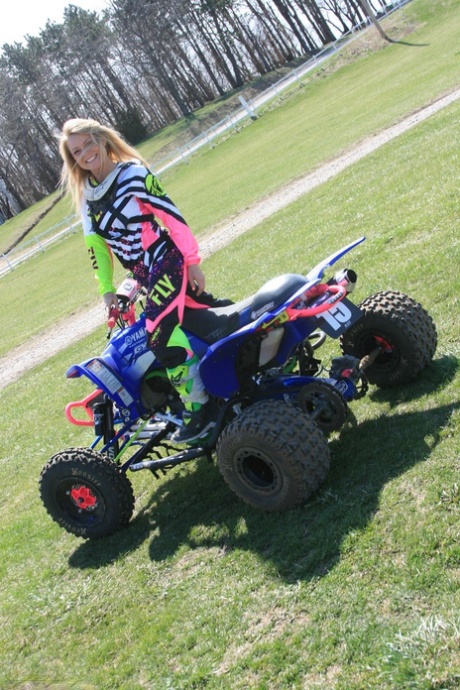 Blonde sports babe Madden shows hot ass while suiting up for four-wheeling 37884326