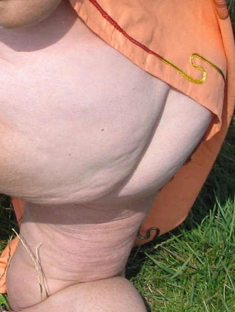 Geeky Grandma Libby flashing her monster mature curves in the filed 51509489