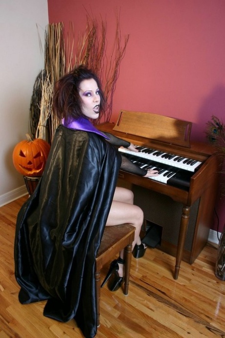 Solo girl Kream releases her enhanced tits while dressed up for Halloween 79663692