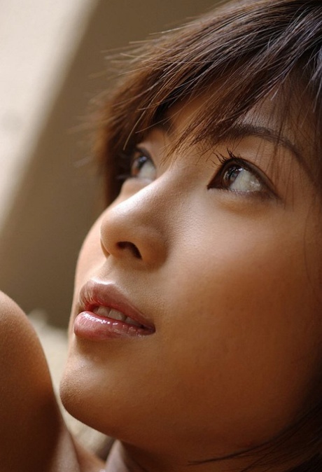 Beautiful Japanese girl Rin Suzuka lets a firm breast loose during solo action 67938688