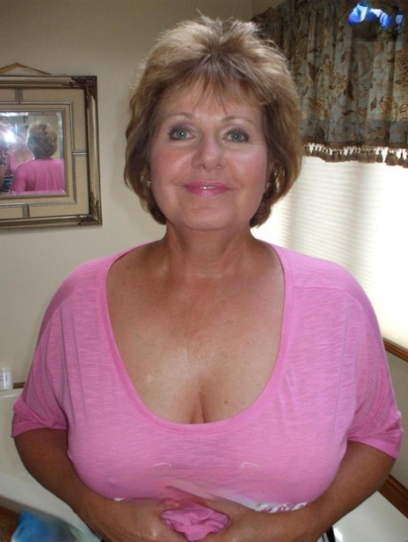 Mature woman Busty Bliss takes a cock in her hand in POV mode 69158175