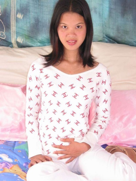 Petite Asian girl cups a firm boob prior to dildoing her snatch 72440047