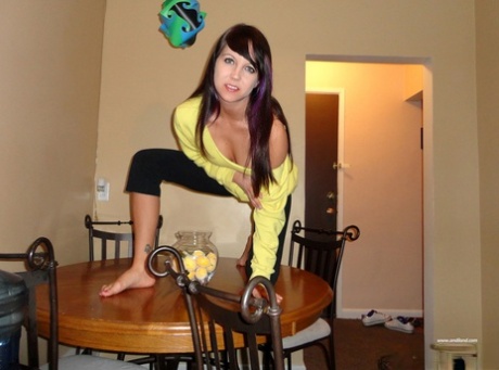 Young amateur Andi Land gets almost entirely naked on a kitchen table 66983328