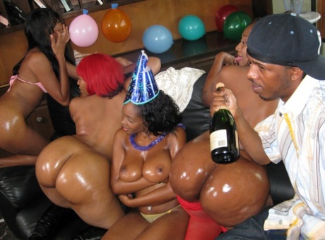Busty ebony chicks suck and fuck a big black dick during a birthday party 23153211
