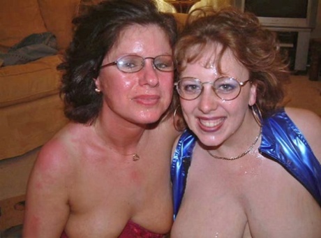 UK chick Curvy Claire and a girlfriend receive cumshots on glasses clad faces 72771410