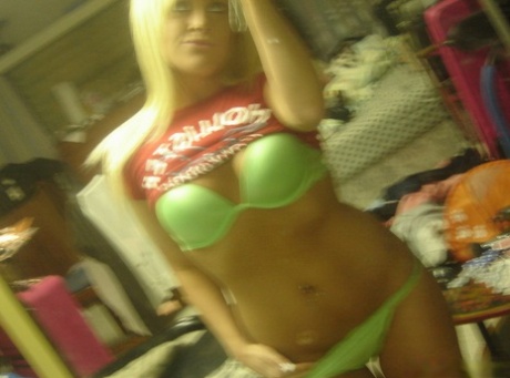 Blonde teen takes selfies while stripping to a bra and thong 22264096