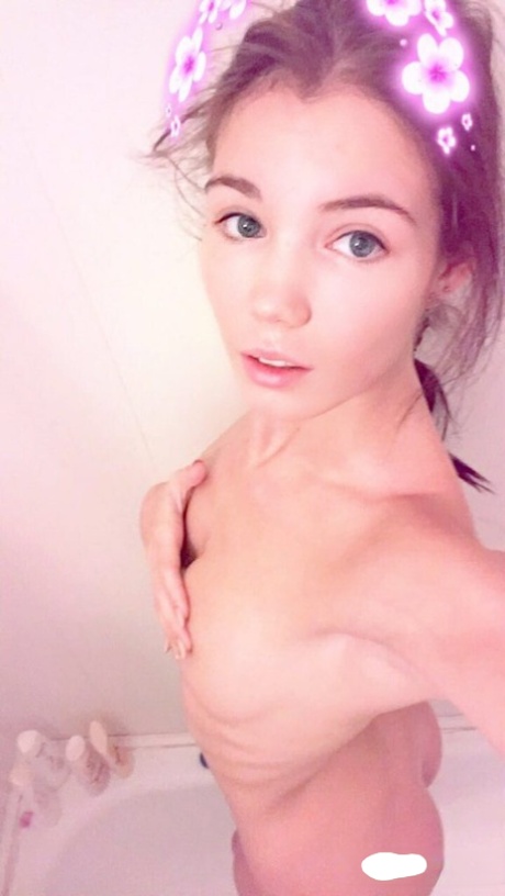 Amateur model Lovenia Lux takes clothed and topless selfies 18290009