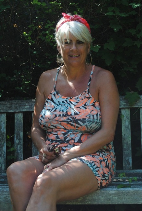 Older platinum blonde Dimonty flashes in public places on a warm day 81125296