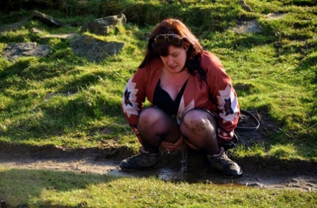 Busty British amateur Juicey Janey pees in a trough after sex in a barn 88835765