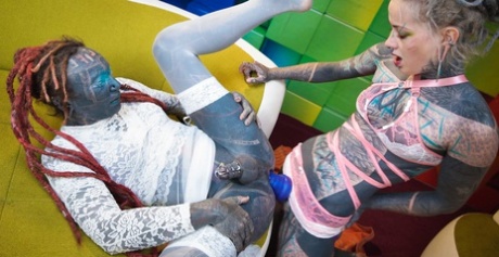 Heavily tattooed girl pegs a totally tattooed crossdressing sissy 98705260