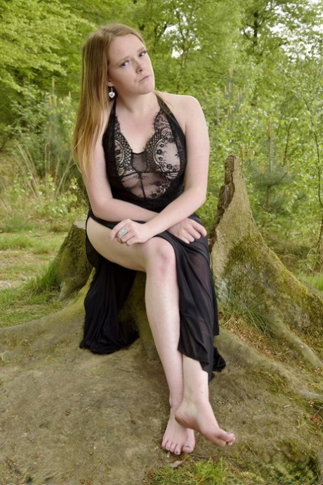 Redheaded amateur Luscious Models wades into a body of water in lingerie 30888124