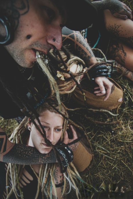 Male and female body modifiers get shot during close-up action while outdoors 44283061