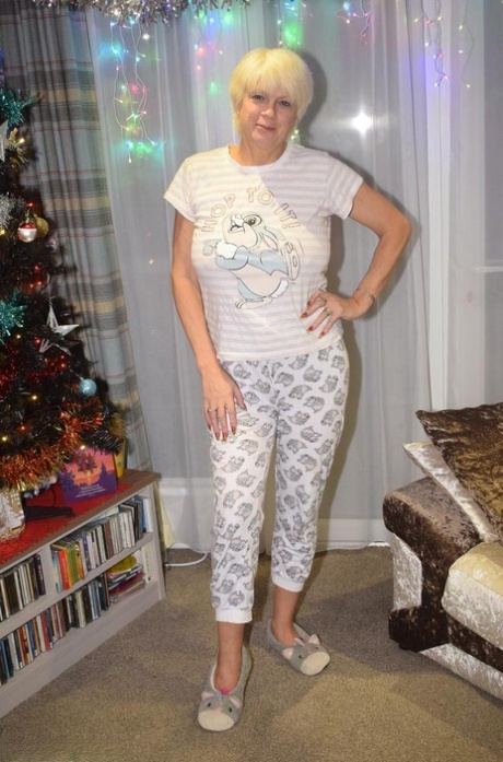 Mature blonde Dimonty shows her tits and ass after decorating for Christmas 42968404