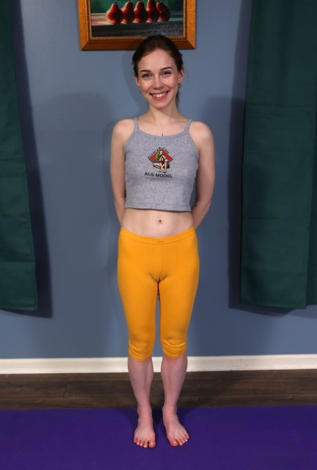 Nice teen Venus Vixen pisses on the floor after doing yoga and toying her cunt 71661130