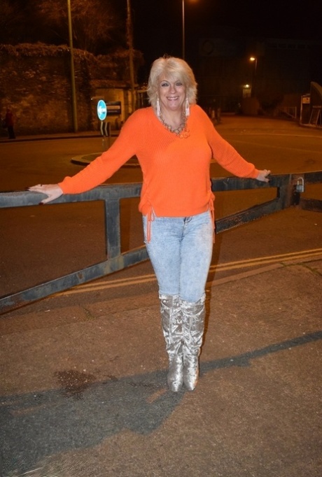 Older blonde Dimonty smokes before getting naked in over the knee boots 92062765