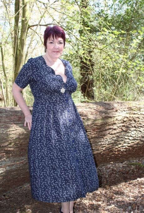 Mature lady with short hair Layla Bird shows her tits and pussy in the woods 92189416