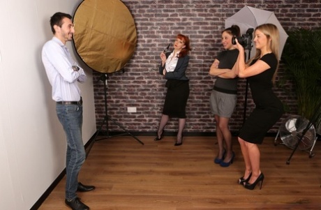 British women watch a male model undress before giving a CFNM handjob 97650635