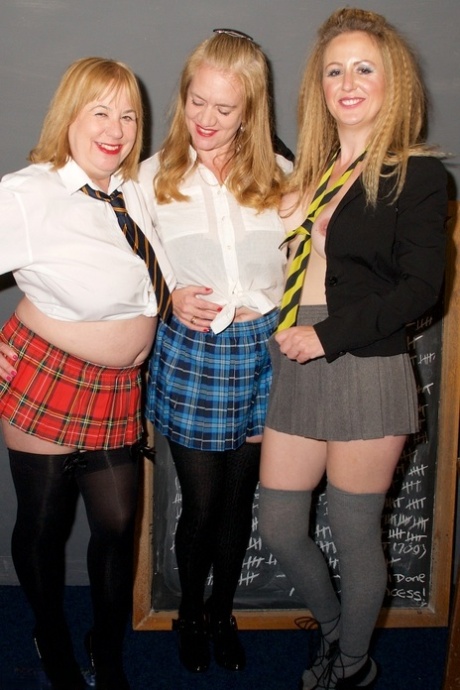 Older and younger lesbian teachers show their natural tits in a classroom 83709981