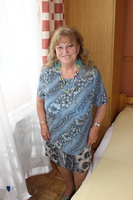 Big titted grandmother has hardcore sex with her younger lover on a bed 95177449