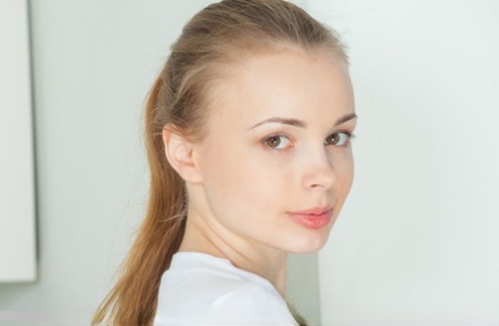 European teen babe Winnie undressing in kitchen for glamour photo spread 87286703