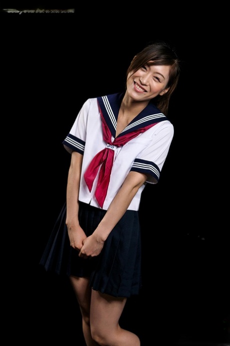 Japanese schoolgirl is forced to suck off a cock in a dog collar and leash 26040815