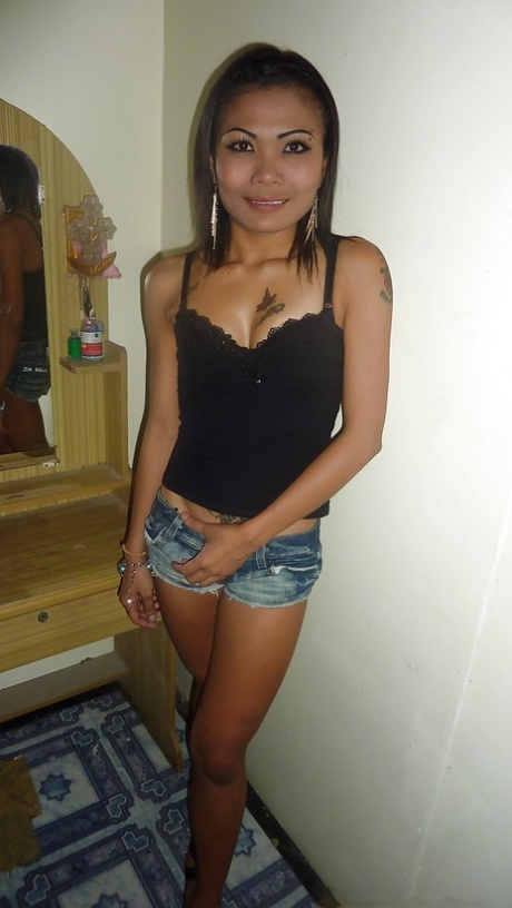 Thai spinner showing off shaved pussy and erect nipples upon tiny tits 79654764