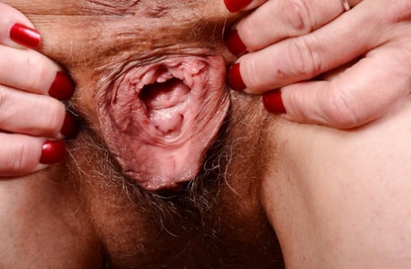 Older babe Cristine Ruby freeing small breasts before hairy pussy spreading 81943803