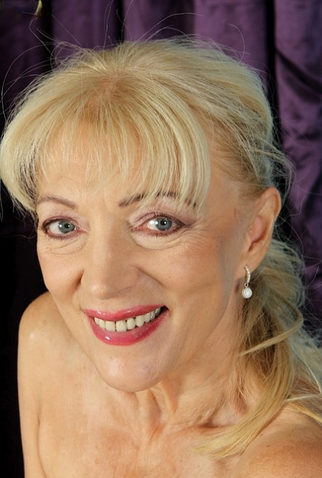 Naughty granny Janet Lesley revealing saggy tits before spreading cooter 55017500