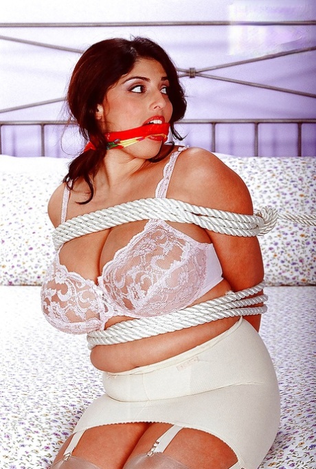 Busty balled gagged Euro pornstar Kerry Marie undergoing BDSM session 45128237