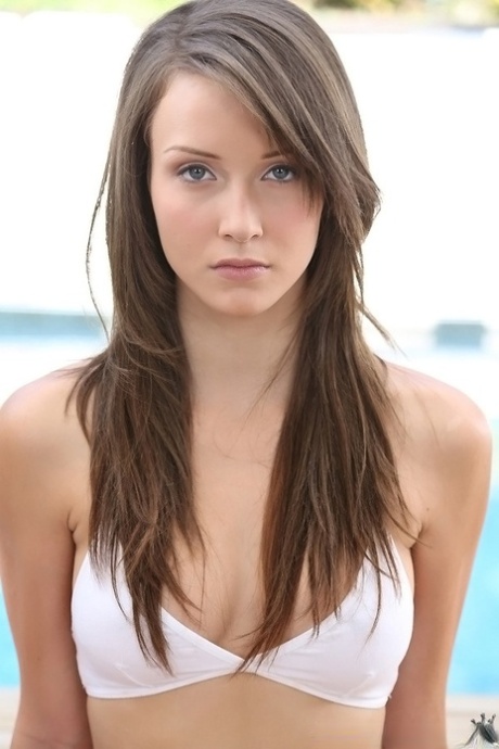 Svelte teenage brunette Natasha Malkova taking off her bikini 67126591