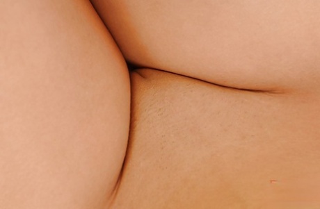 Ample-breasted brunette babe teasing her juicy honey pot on the bed 28486413